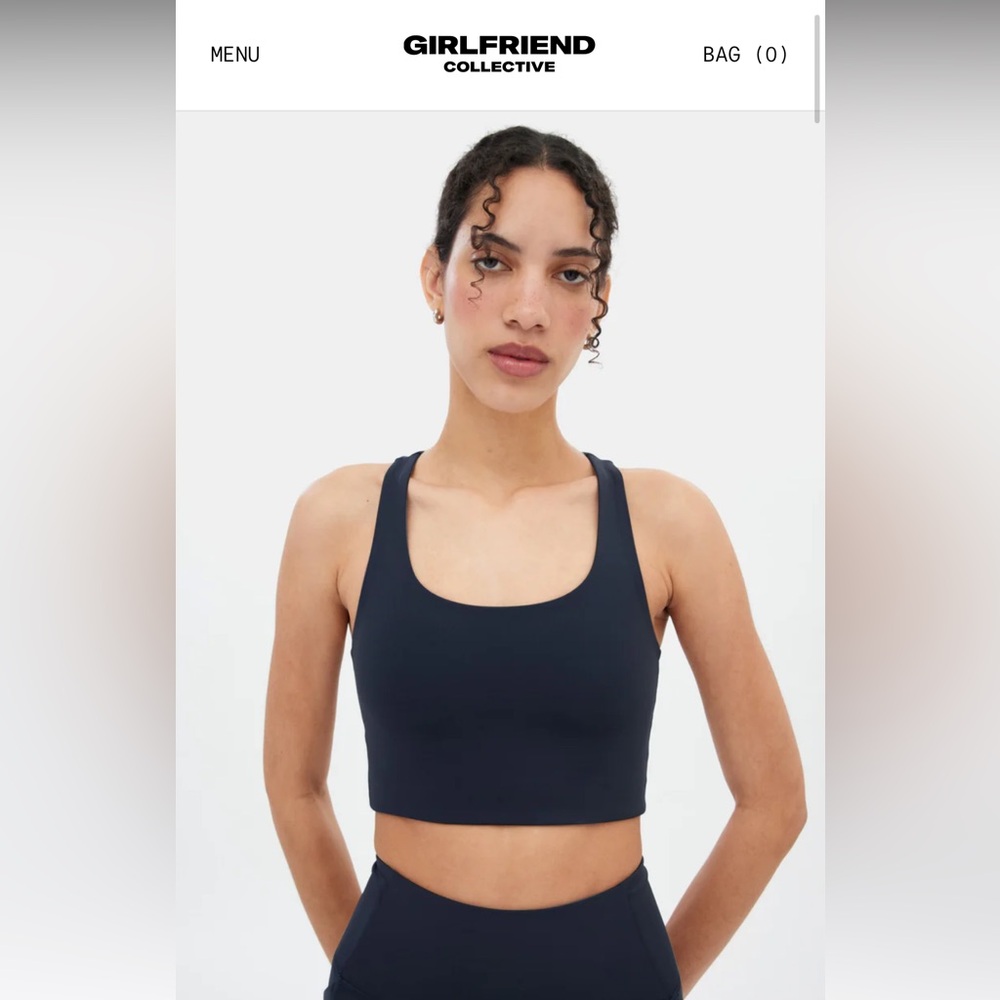 Navy medium racer back sports bra from Girlfriend collective
